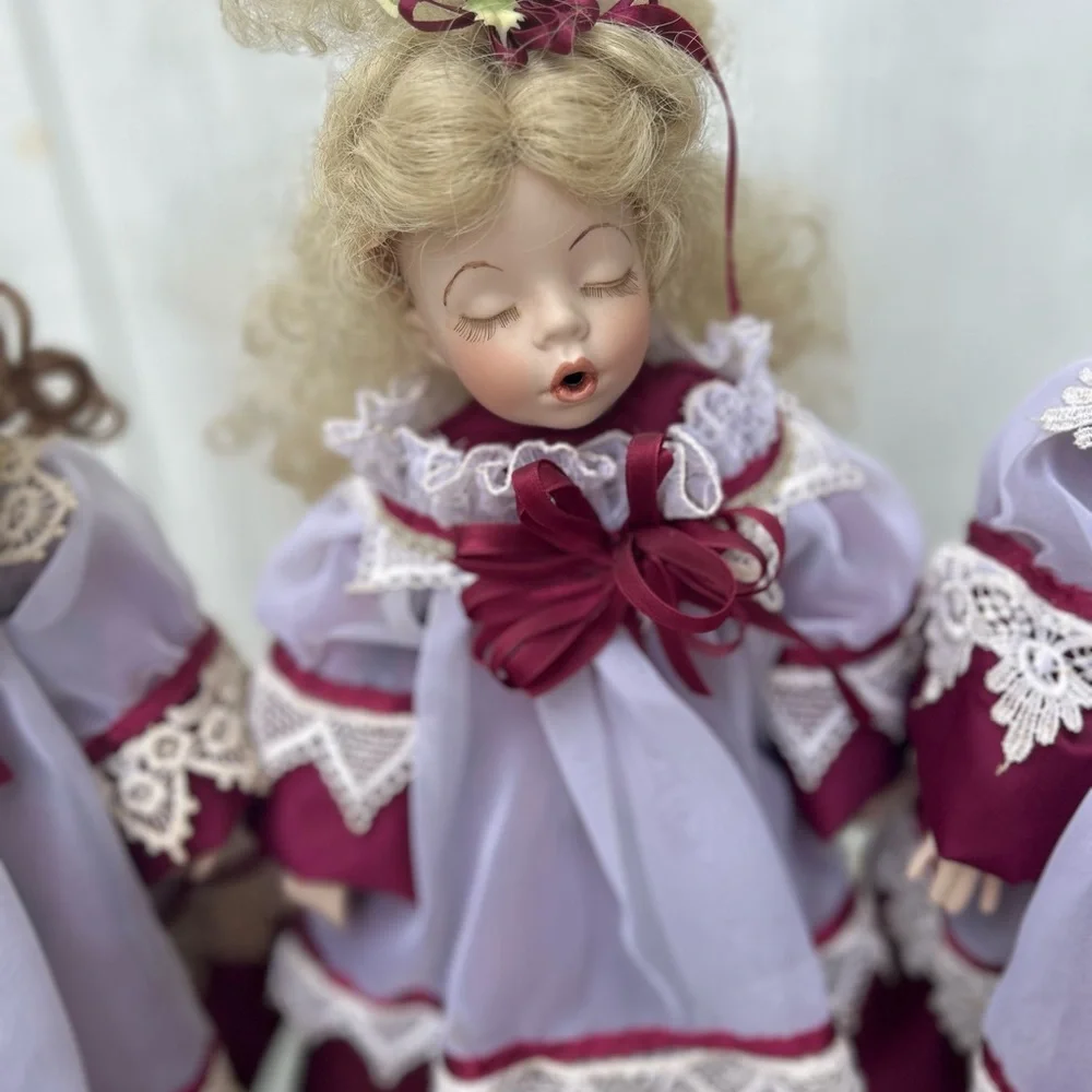Hand Crafted Porcelain Caroler Dolls Set